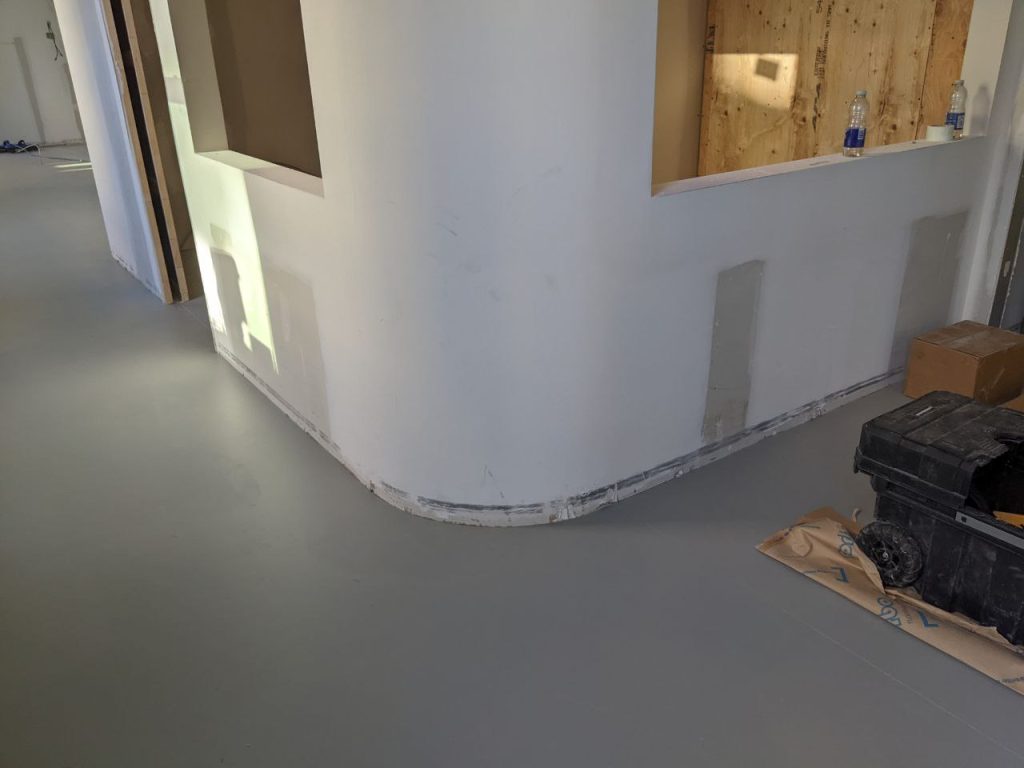 Rounded corner made from prefabricated drywall on a finished wall (except paint) in an apartment building