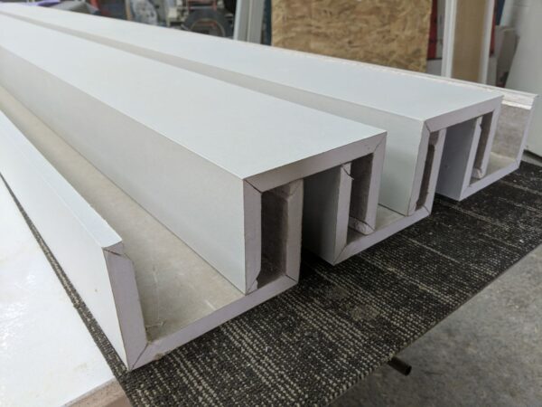 Multiple column U pieces made from prefabricated drywall stacked into each other